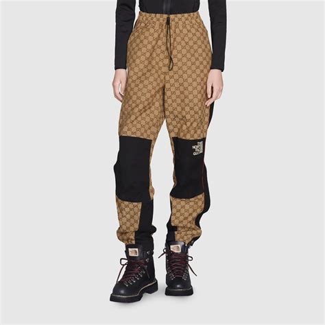 pantaloni gucci per north face